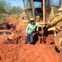 4 The grader got stuck pulling out my ute.